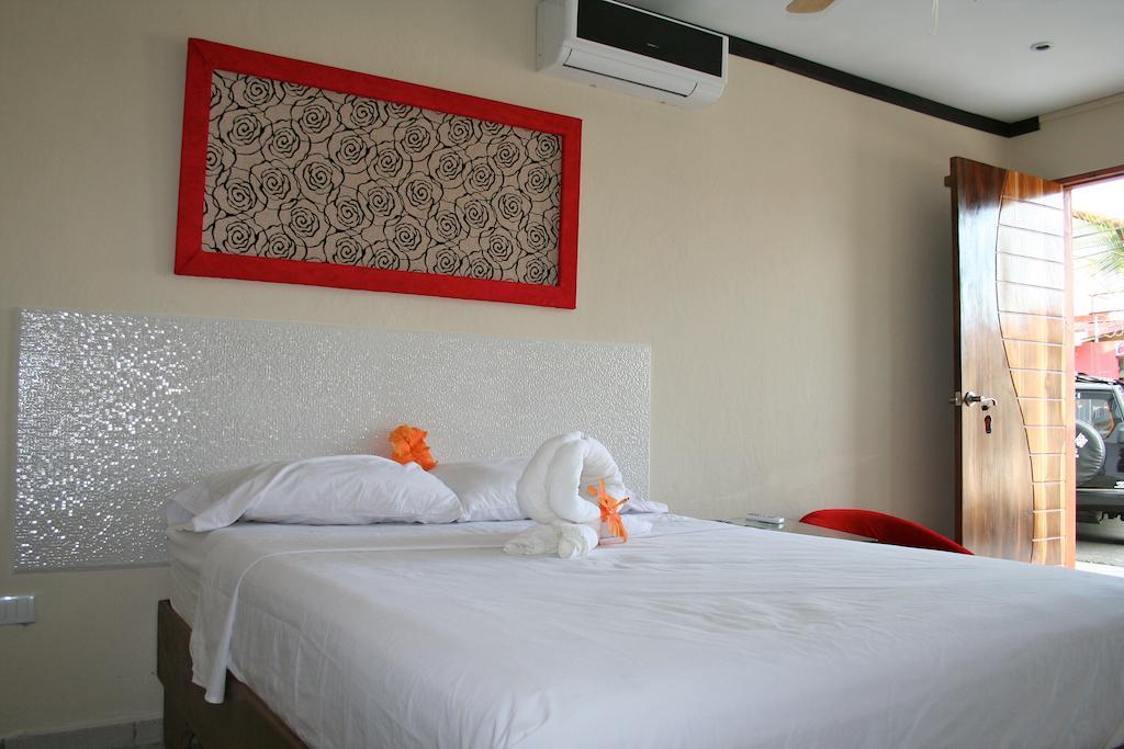 Tuanis Aparthotel Jacó Camera foto